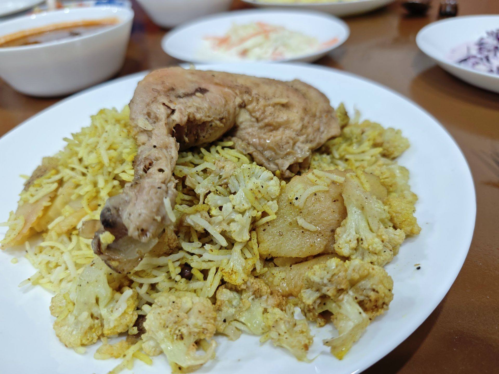Al-Quds qidra with chicken over spiced rice